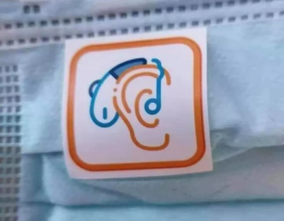 This Sticker on a Mask Means That The Person is Hearing Impaired