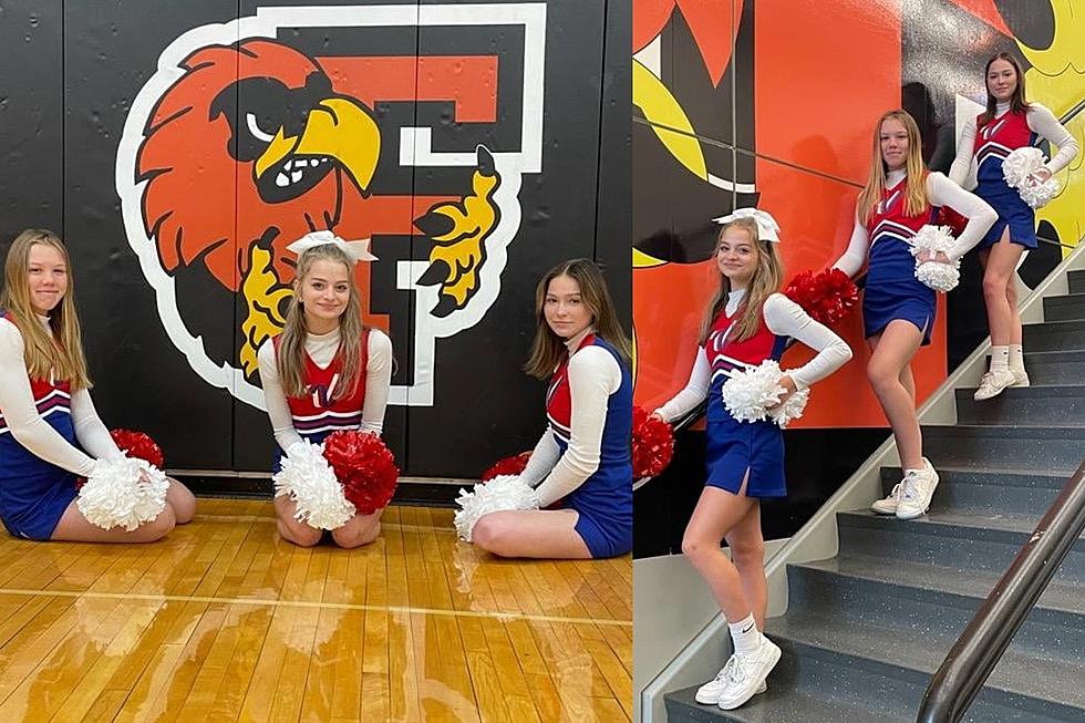 Three Flushing Varsity Cheerleaders Are Cheering At The Citrus Bowl on New Years Day