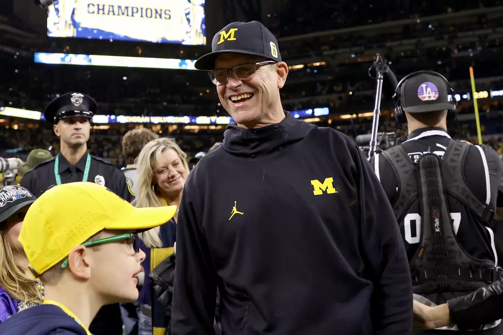 Did U of M Coach Harbaugh Really Tell Team He’d “Help Raise Their Baby”?