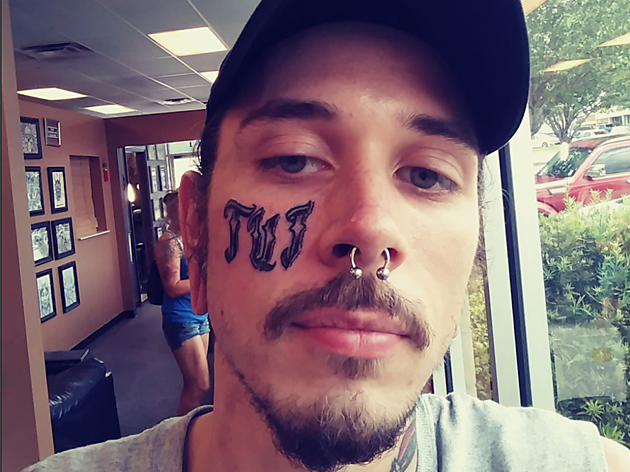 Why Would You Get a Band Tattooed on Your Face?