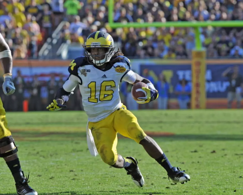 Denard Robinson Changes To College Number With Jaguars