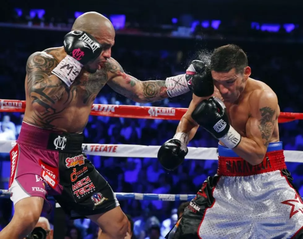 Miguel Cotto Makes History With Impressive Win Over Sergio Martinez