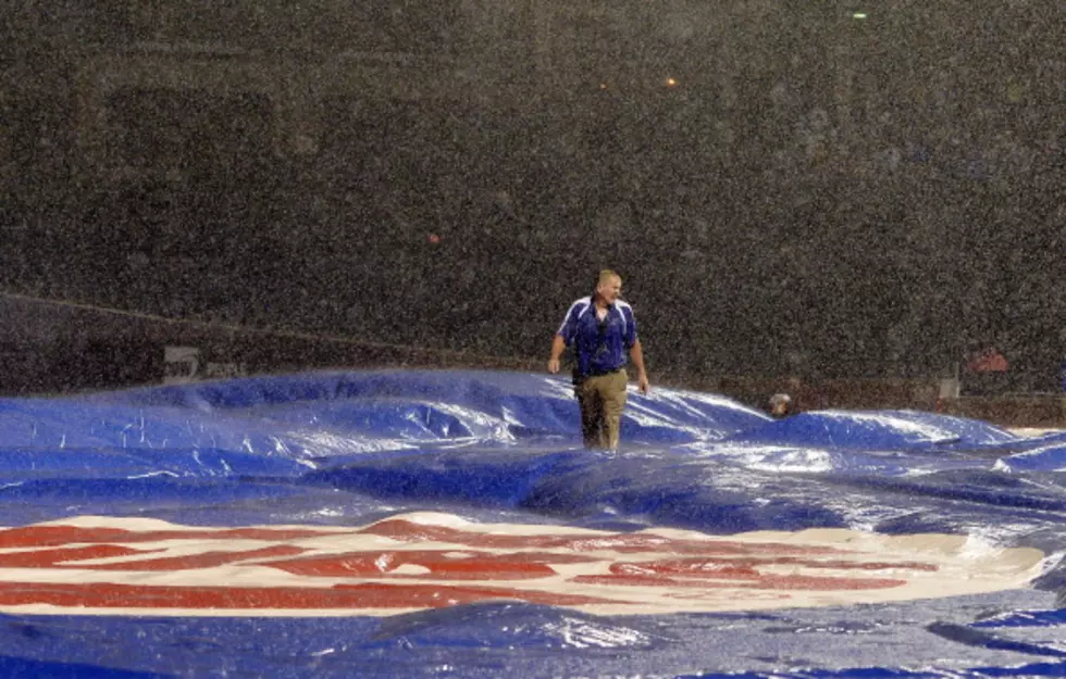 Chicago Cubs Grounds Crew Battles Rain and Tarp [Video]