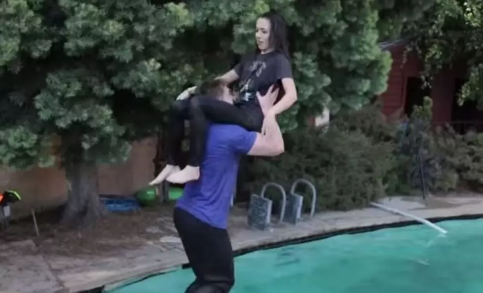 Pro Wrestling Fan Performs WWE Finishing Moves On Girl In Swimming Pool [VIDEO]