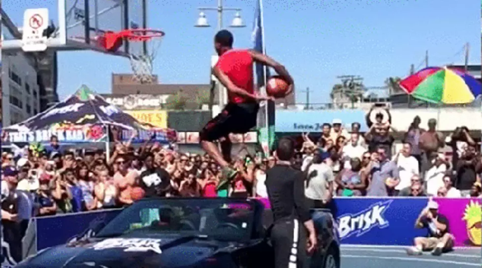 Amazing Behind-The-Back Dunk Over a Car