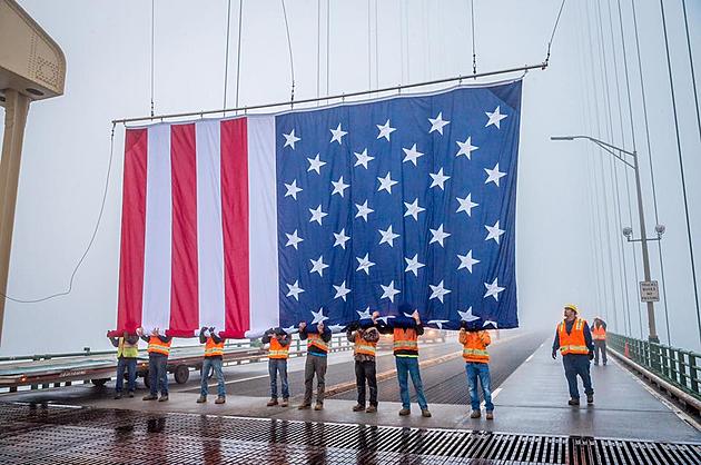 Michigan Honors Fallen Soldiers by Flying Massive American Flag from Mackinac Bridge on Memorial Day