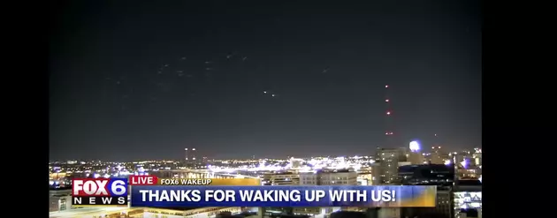 Watch Bizarre UFOs Light Up Over Lake Michigan