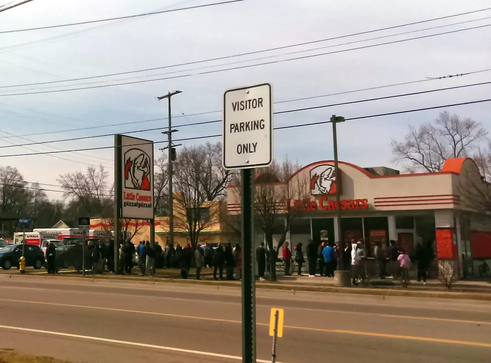 Lines Wrap Around the Building at Kalamazoo Little Caesars for Free Lunch