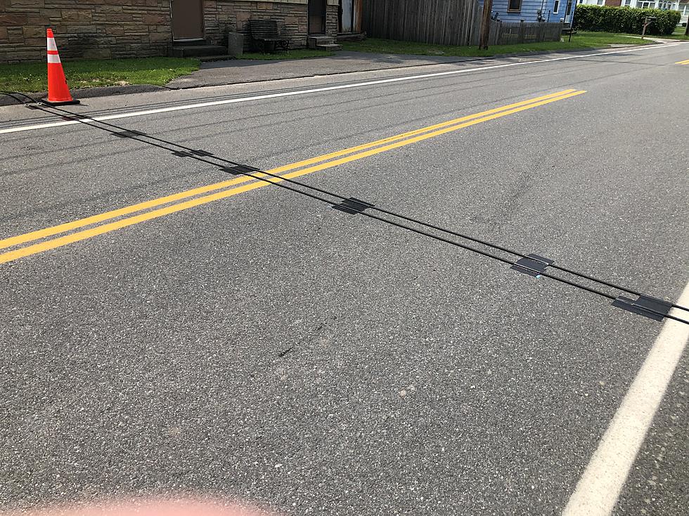 Here&#8217;s What Those Two Black Cables On The Road Mean