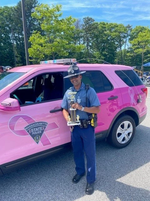 MA State Police Pink Cruiser Collects Best Police Cruiser Trophy pic picture