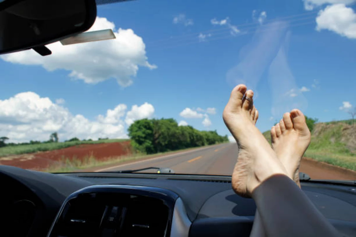 Why you should never ride with your feet on the dash of your car