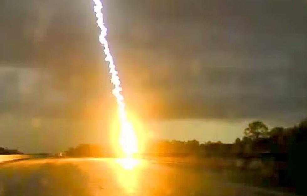 Police Dash Cam Captures Amazing Lightning Strike [watch]