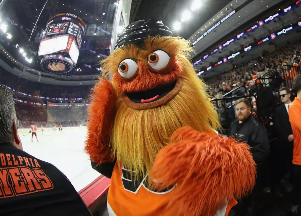 Philadelphia Flyers mascot Gritty waves to fans during the NHL All-Star  Game on Saturday, Feb. …