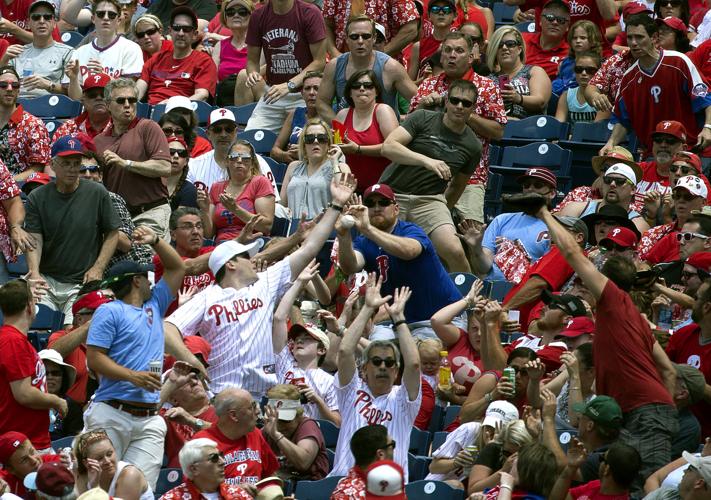 10-year-old Phillies fan gives foul ball to crying girl