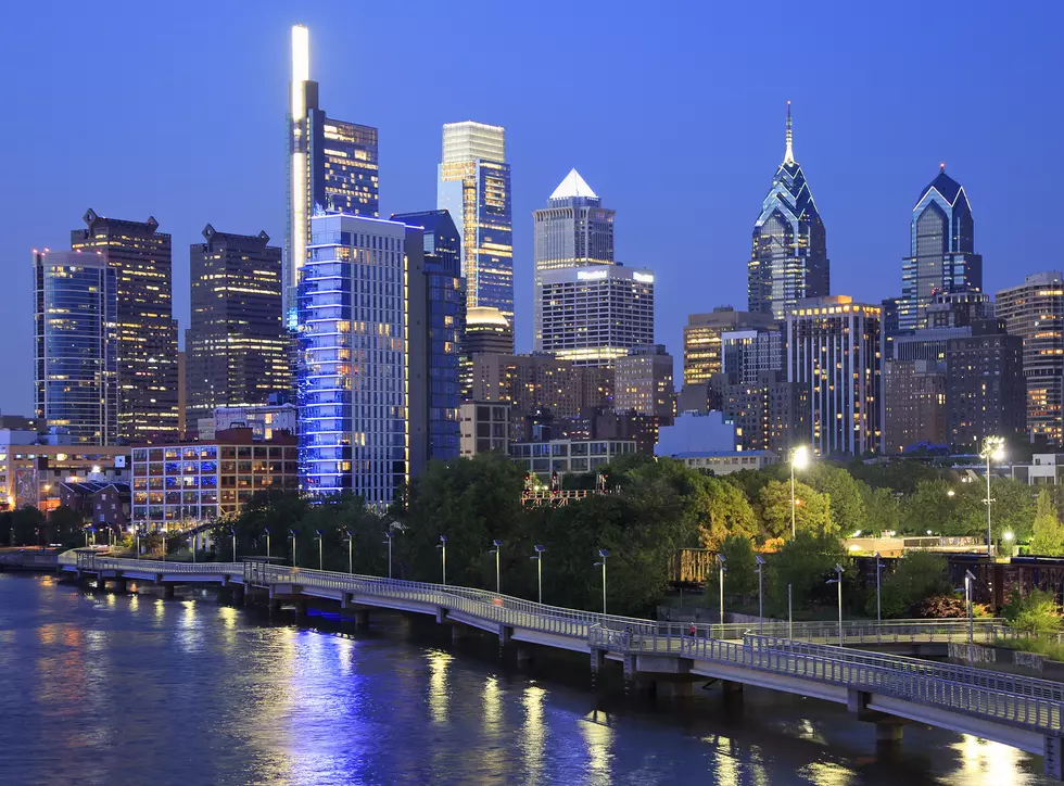 Philadelphia skyline at night with the Schuylkill River on the foreground, USA