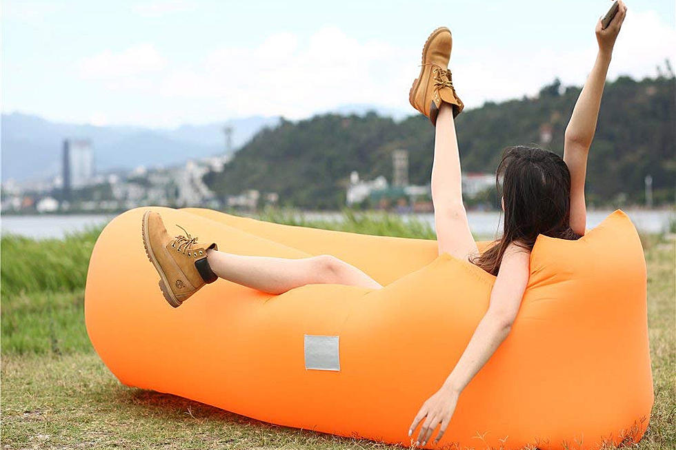 The Inflatable Lounger That Will Knock Your Socks Off & Let You Kick Your Feet Up