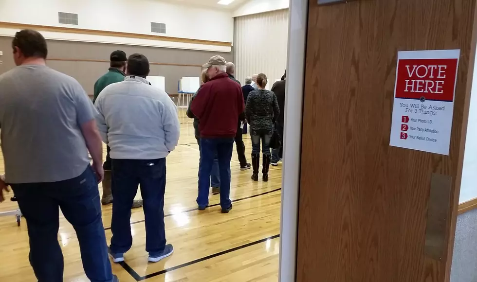 Voters Cast their Ballots, Some with Trepidation (PHOTOS)