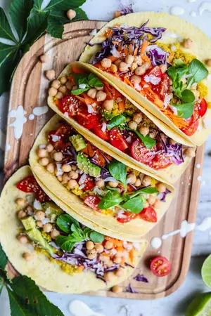 Curried Quinoa and Vegetable Tacos With Garlic-Tahini Dressing