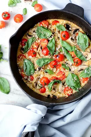 Vegan Polenta Frittata With Mushrooms, Tomatoes and Basil