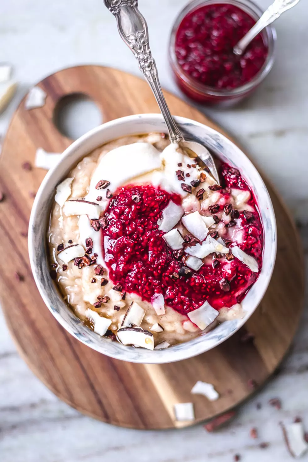 Creamy Vegan Rice Pudding Topped With Raspberry Chia Jam