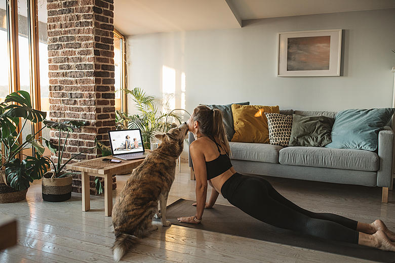 Why Your Dog Always Wants to Practice Yoga With You