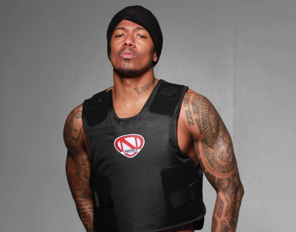 UpscaleHype - Nick Cannon wears a Custom Mask, Vest and Sneakers