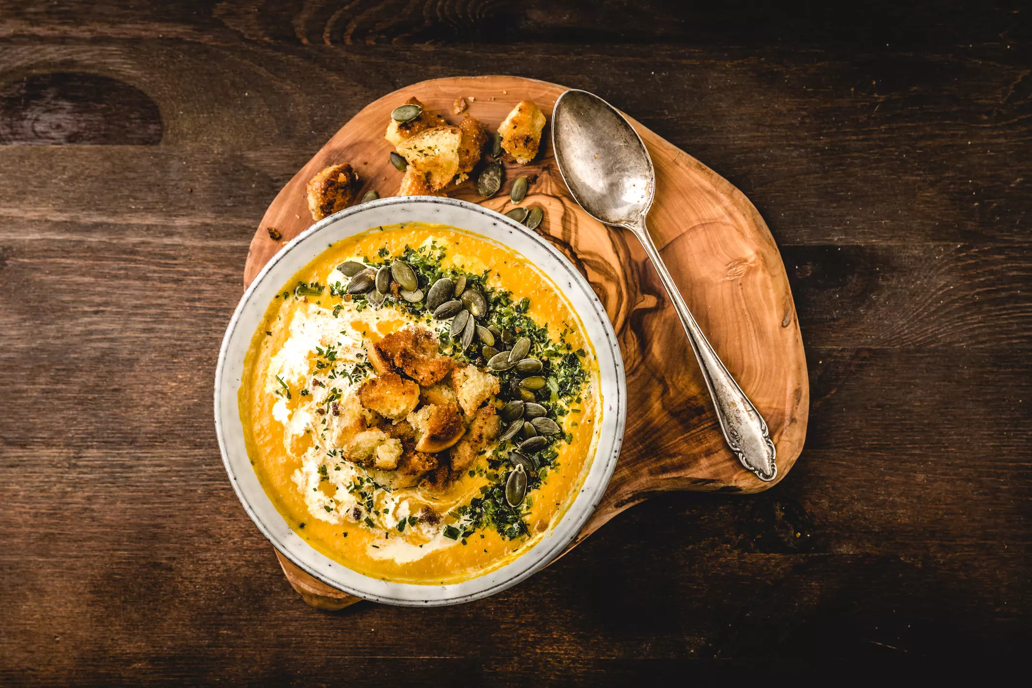 Pumpkin Soup With Cream,Herbs And Seeds