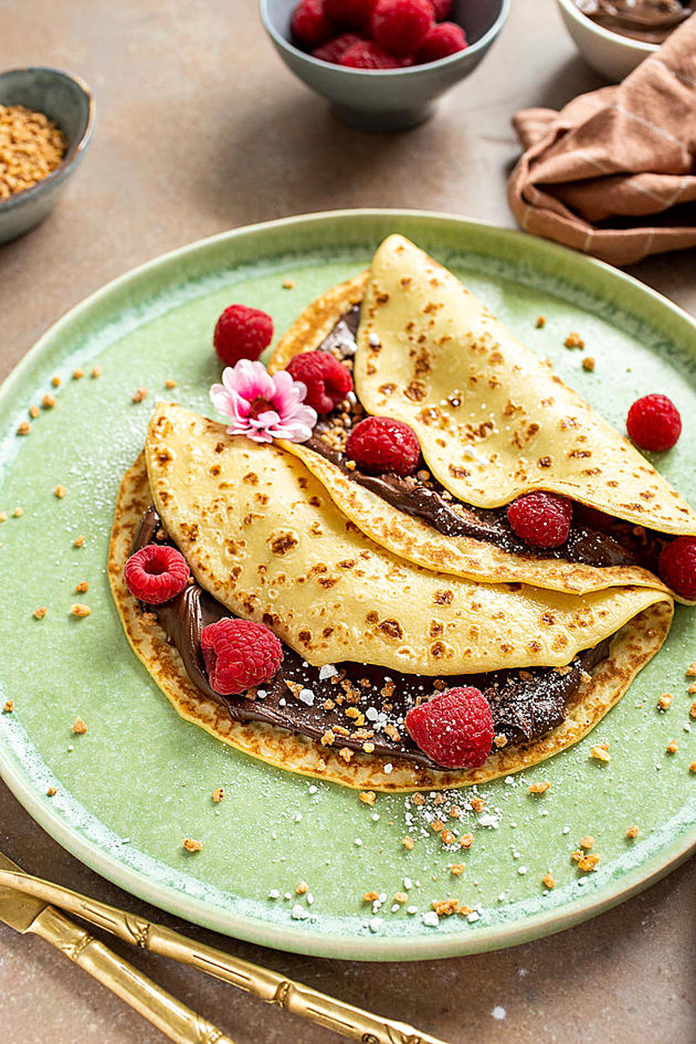 Sweet Vegan Crêpes Filled with Nutella, Hazelnuts, and Raspberries