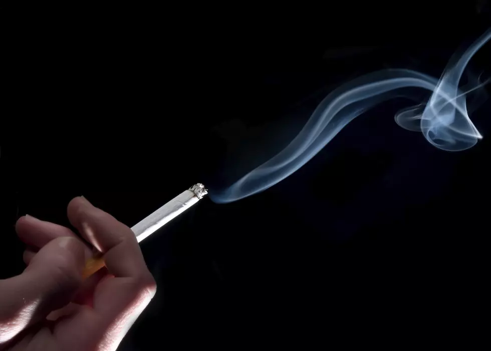 Smoking a cigarette