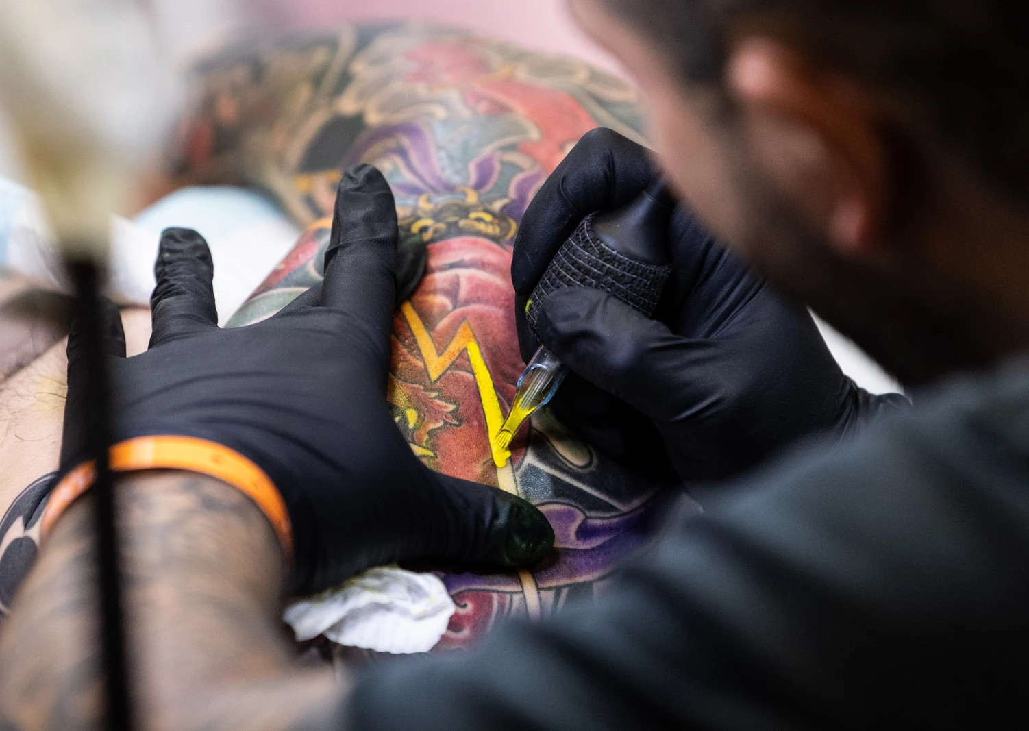 Tattoo artist sees bump in desire to erase hateful skin art  KX NEWS