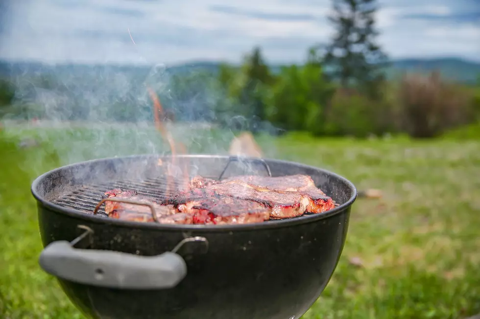 Beef steaks on the grill. copy space for your text