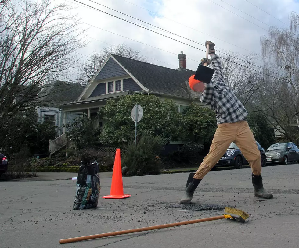 Oregon Anarchist Group Showing Their Anger By Fixing Potholes