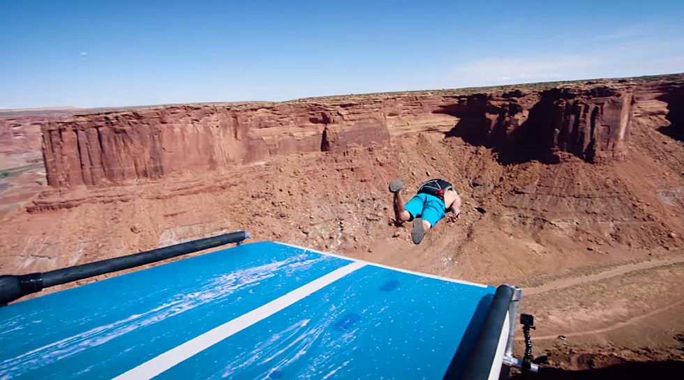 This is New: BASE Jumping Off of a Slip and Slide (WATCH)