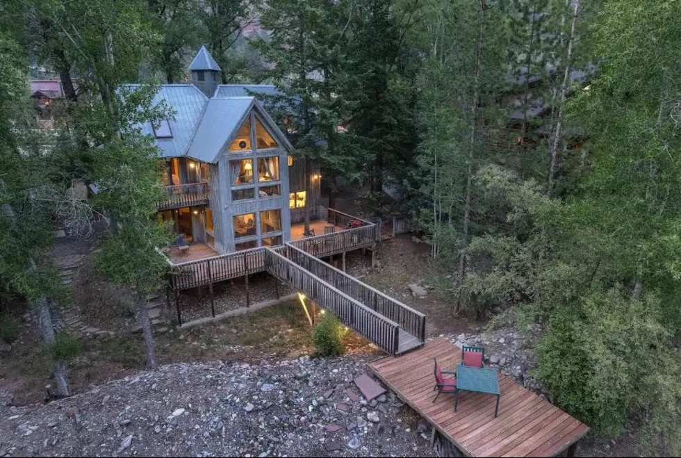 Plan a Relaxing Colorado Getaway at This Rustic Riverfront Cabin