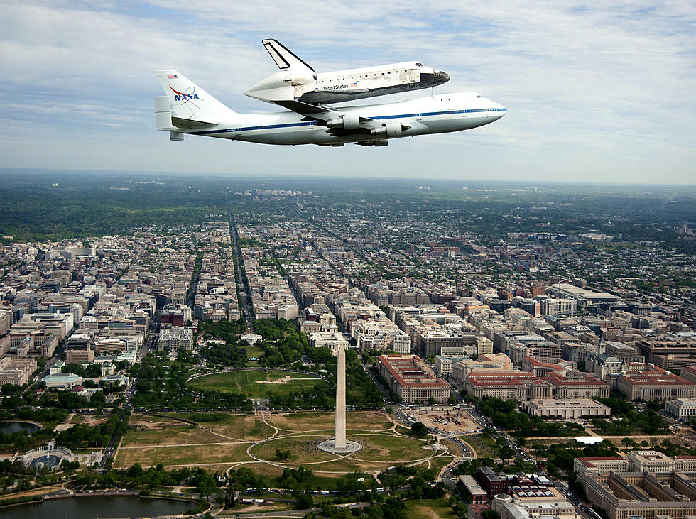 Space Shuttle Discovery Flies Victory Laps Over Washington D.C.