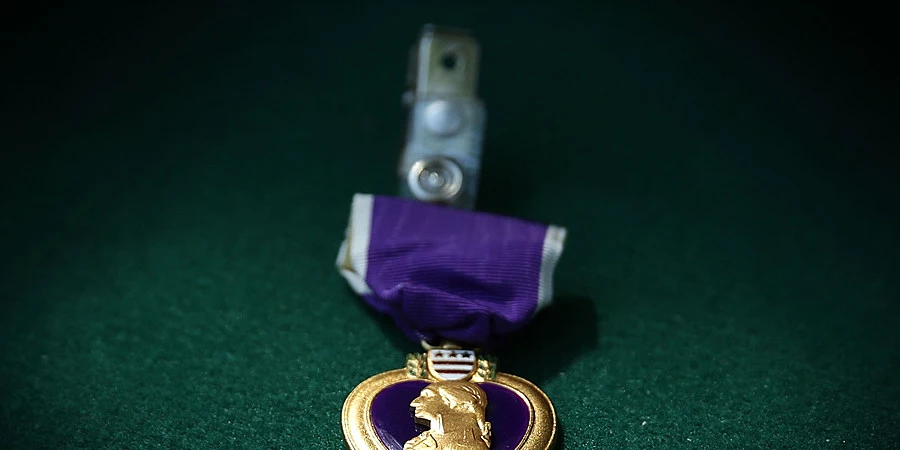 Does the purple heart medal deals have your name on it