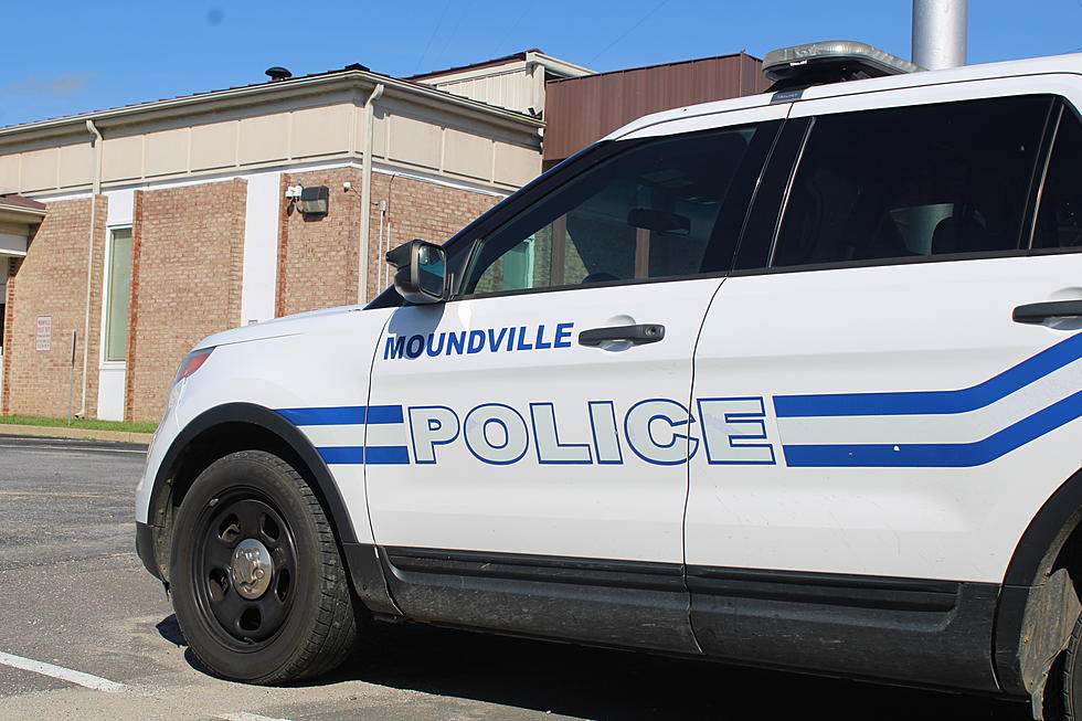 Bullet Shot Through Window of Empty Newspaper Office in Downtown Moundville