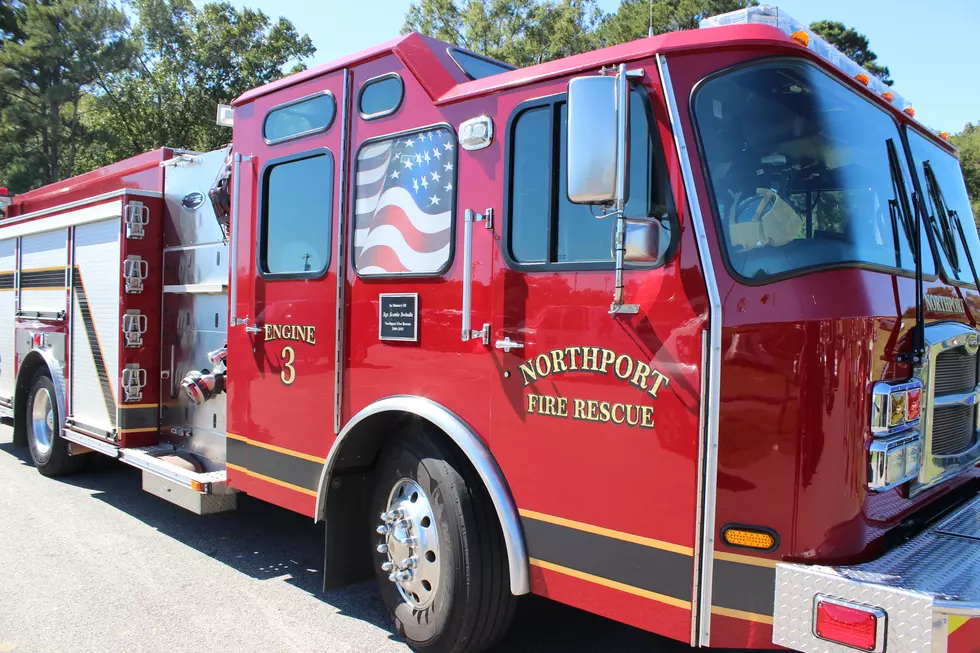 Northport Firefighters Working to Extinguish Major Vehicle Fire at Gas Station