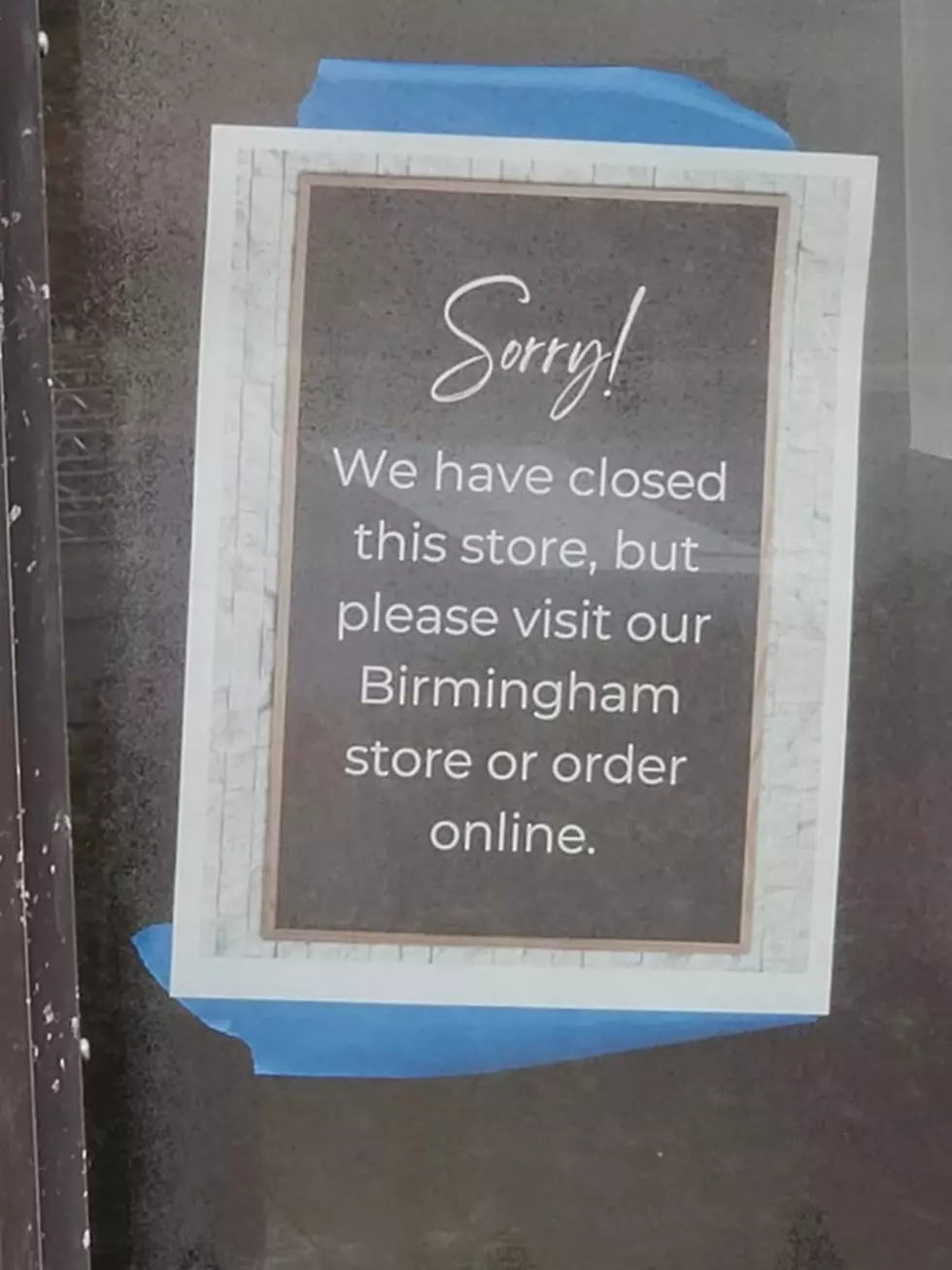 A sign in the window of Tuscaloosa's Steel City Pops indicates the gourmet popsicle shop has permanently closed.