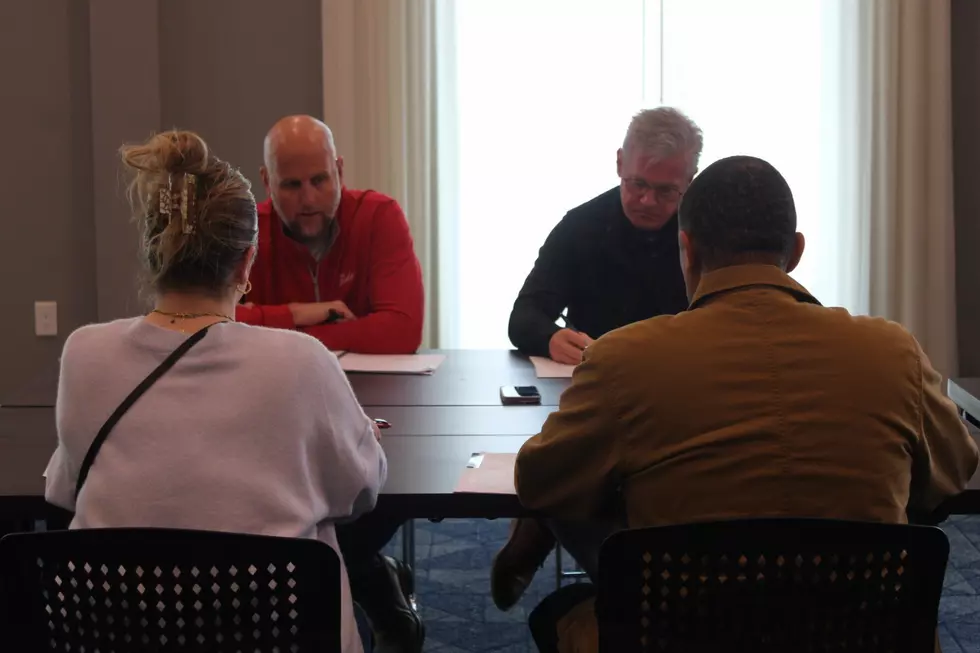 Fikes, right, and Donahue face the other board members (Stephen Dethrage | Tuscaloosa Thread)