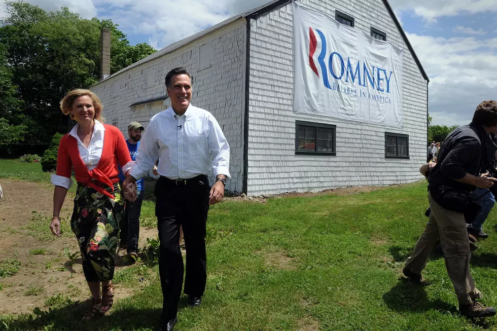 Mitt Romney (2nd L), with wife Ann (L), prepares to announce his candidacy for the Republican presidential nomination June 2, 2011 at Bittersweet Farm in Stratham