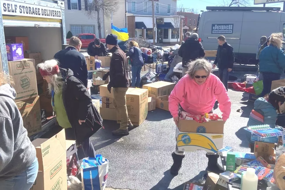 Volunteers sorting through donations for Ukrainian refugees