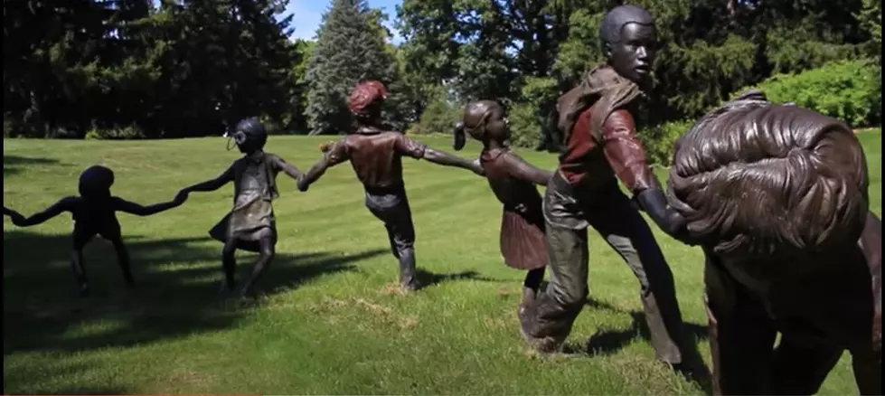 Flint, Michigan Cemetery’s Haunted ‘Crack the Whip’ Sculpture May Come to Life at Night